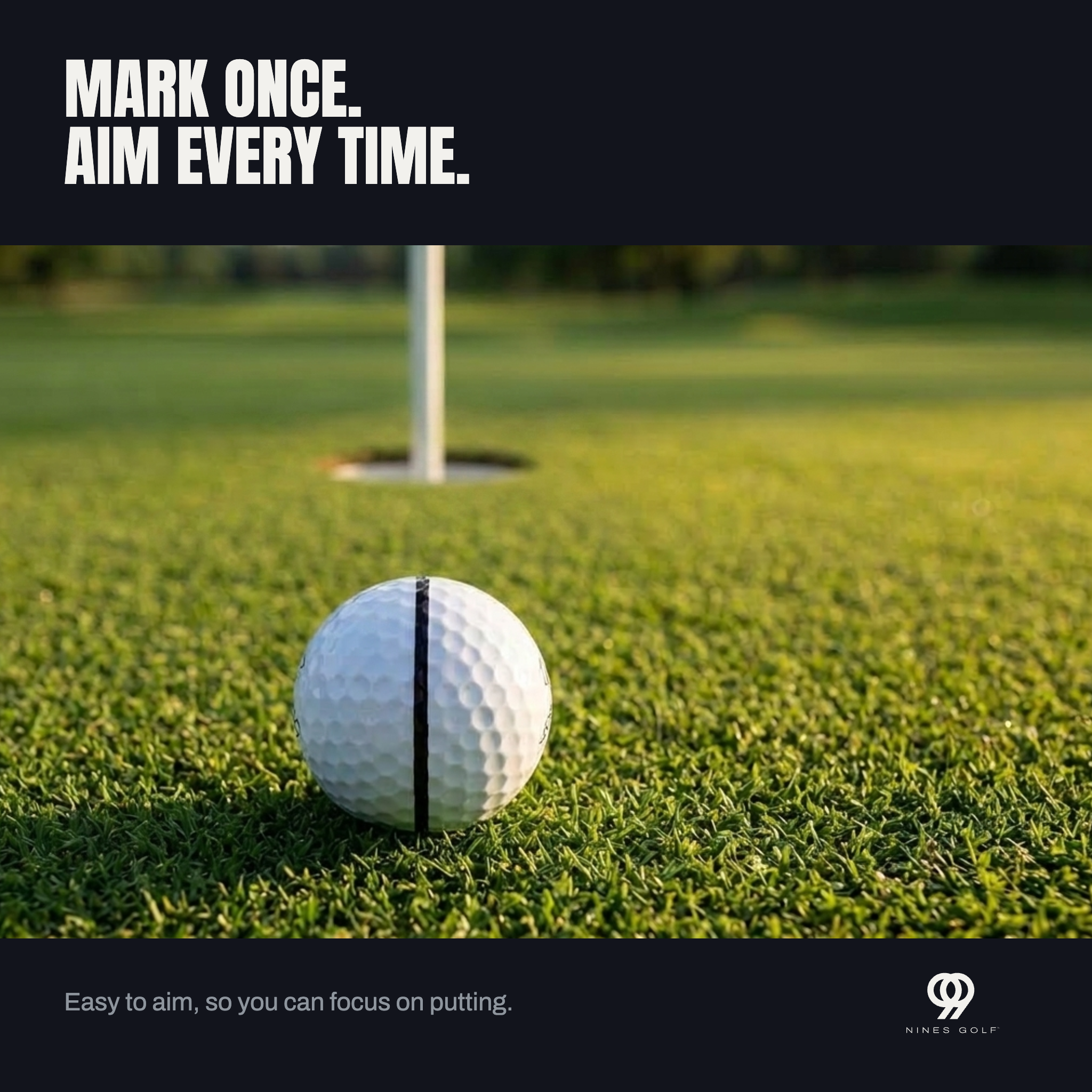 A golf ball marked with the Halo lined up to the hole on a putting green, flagstick behind it